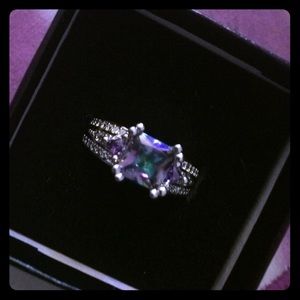 Silver toned mystic topaz ring